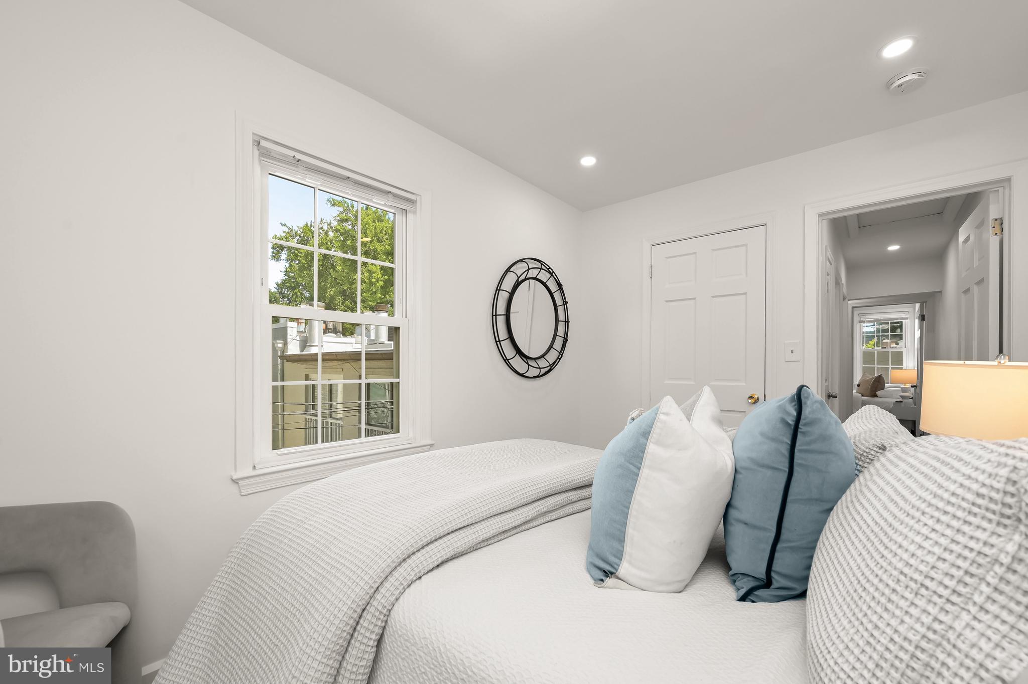 2805 Olive Street Northwest Washington, DC 20007 - Photo 20 of 30 a bedroom with bed and a window with outer view