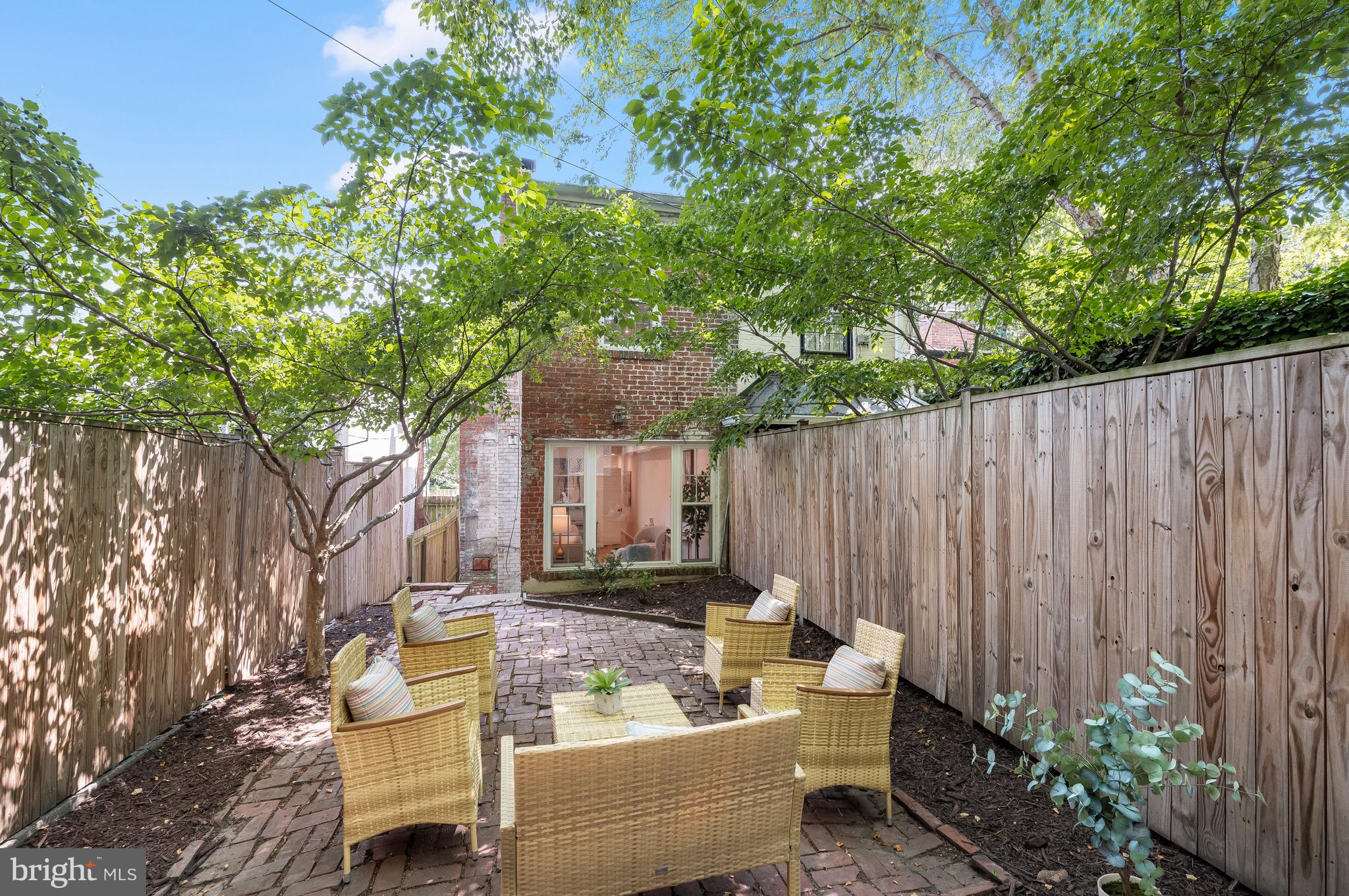 2805 Olive Street Northwest Washington, DC 20007 - Photo 5 of 30 a view of a backyard with sitting area and furniture