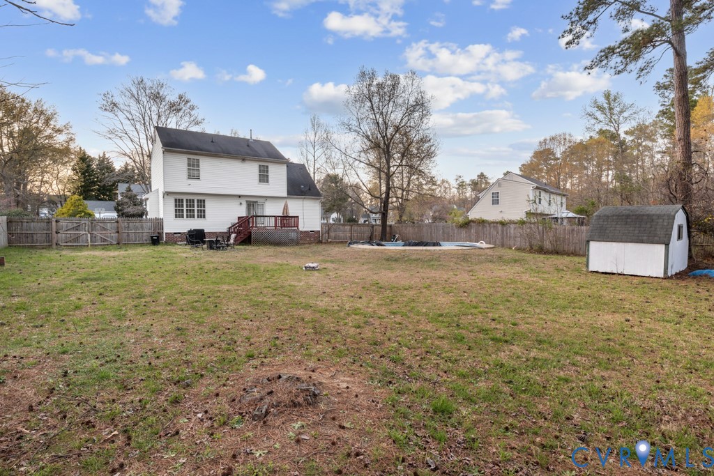 4025 Frye Terrace Colonial Heights, VA 23834 - Photo 11 of 14 Expansive rear yard featuring a white two-story re