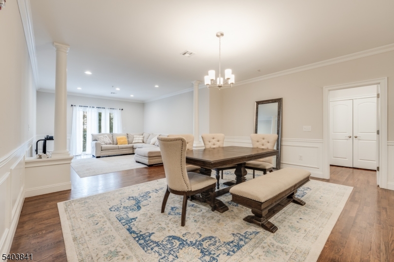 231 River Road, Unit 231 Somerville, NJ 08876 - Photo 11 of 31 a living room with furniture and a table