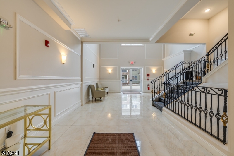 231 River Road, Unit 231 Somerville, NJ 08876 - Photo 4 of 31 a view of entryway with livingroom and furniture