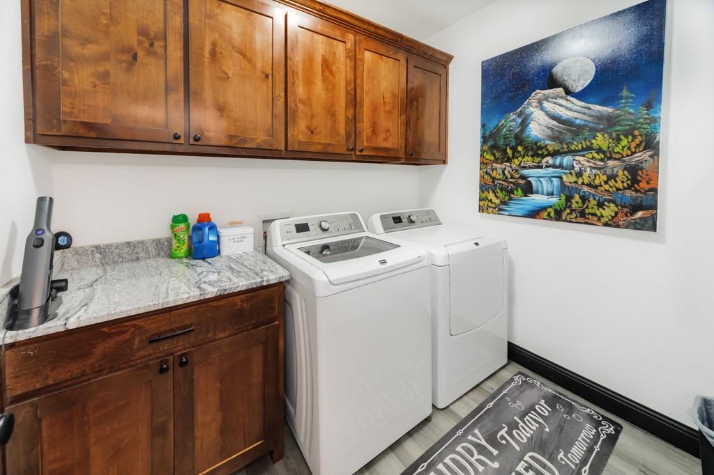 217 Polk Road Bowie, TX 76230 - Photo 18 of 39 a utility room with dryer and washer