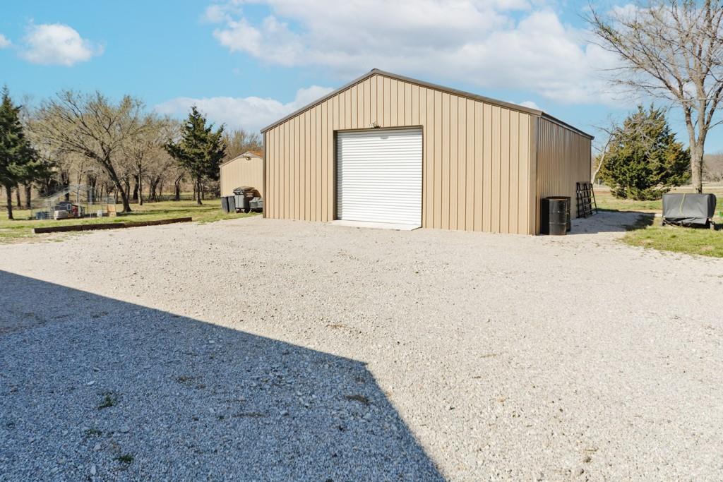 217 Polk Road Bowie, TX 76230 - Photo 34 of 39 a view of backyard of a house
