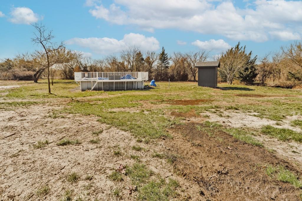 217 Polk Road Bowie, TX 76230 - Photo 38 of 39 a view of a lake with houses