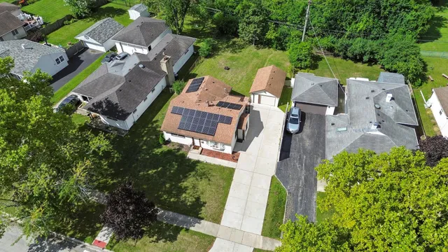 an aerial view of house with outdoor space