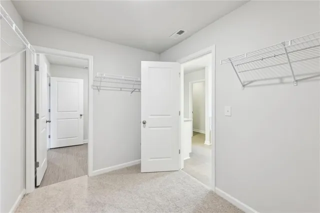 an empty room with a bathroom