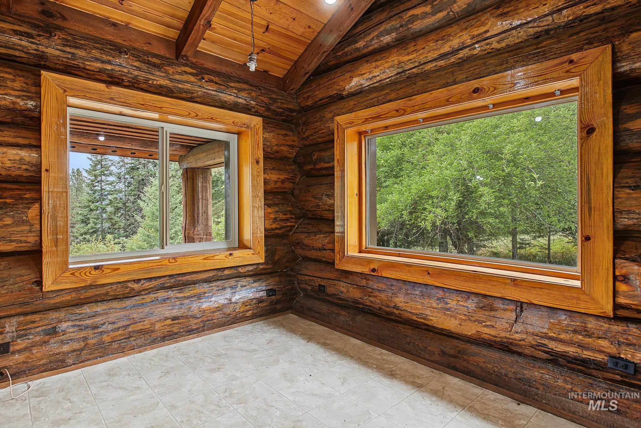 2926 Wells Bench Road Orofino, ID 83544 - Photo 11 of 48 Natural log walls and exposed wood beams