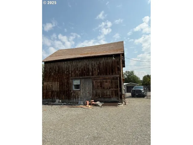 a view of car parked in front of house
