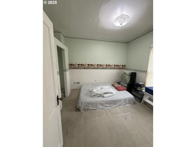 a bathroom with a sink mirror vanity and toilet