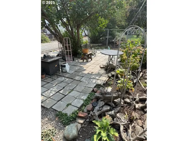 a backyard of a house with lots of green space