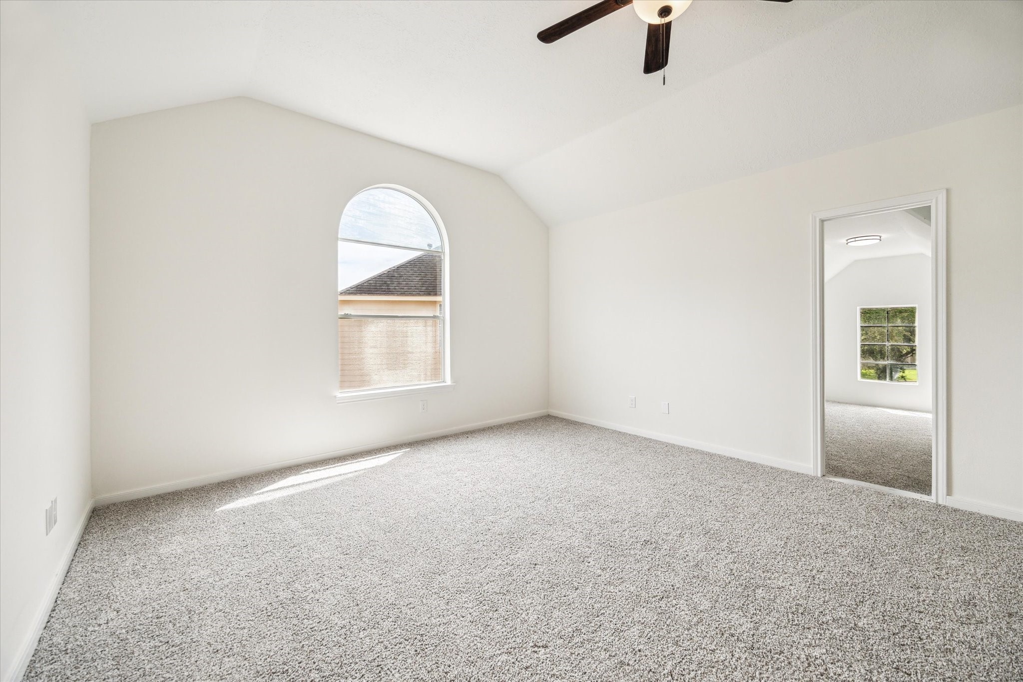 25403 Myrtle Springs Spring, TX 77373 - Photo 12 of 16 an empty room with windows and cabinet