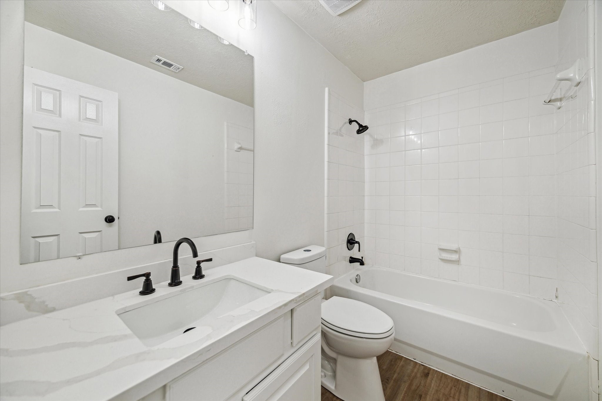 25403 Myrtle Springs Spring, TX 77373 - Photo 13 of 16 a bathroom with a sink and a toilet