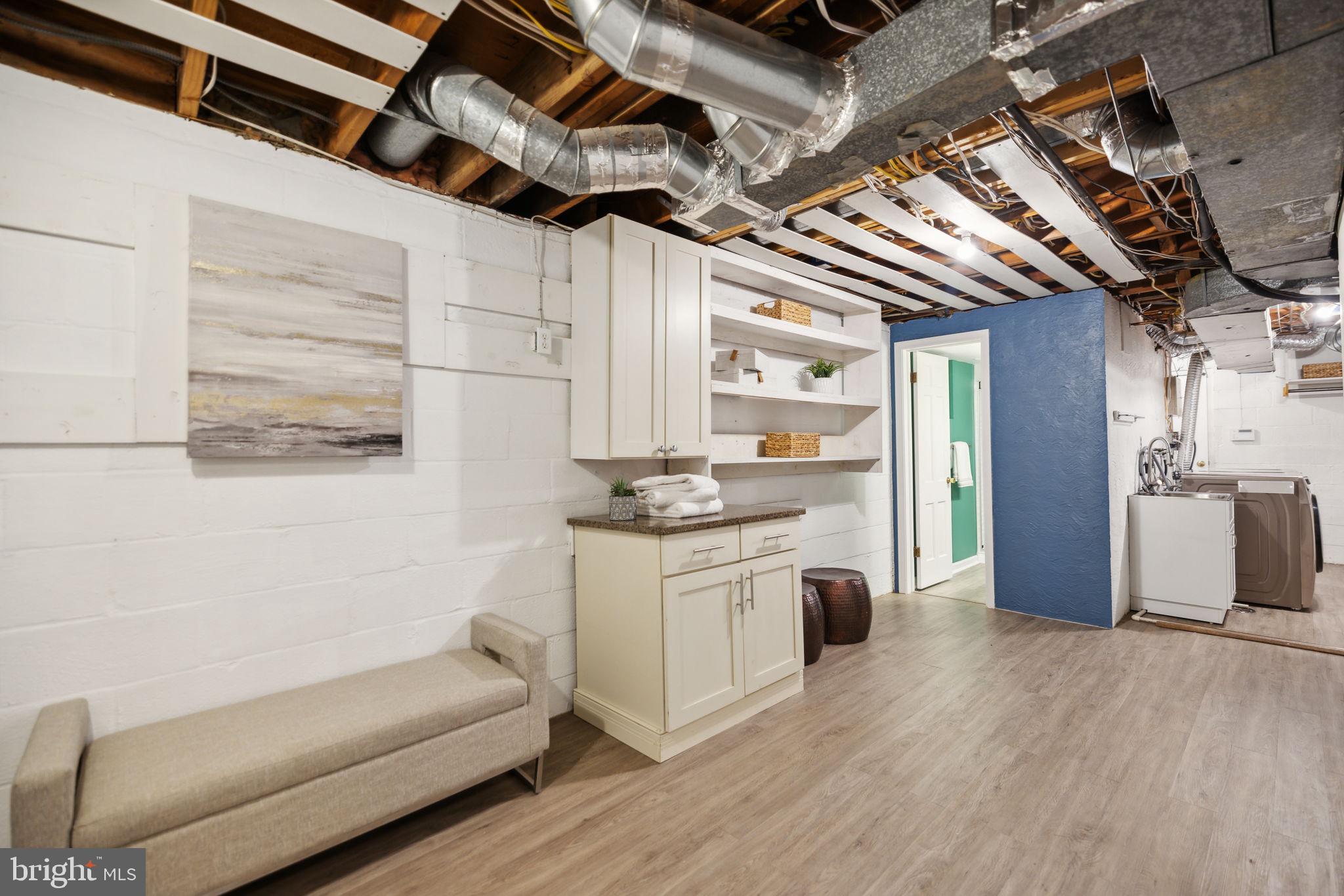 8012 Beech Tree Road Bethesda, MD 20817 - Photo 19 of 25 a kitchen with stainless steel appliances granite countertop a stove and a white cabinets