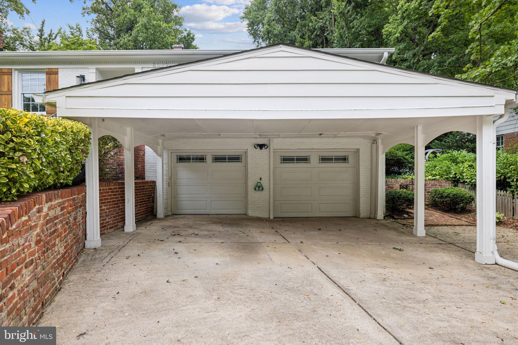 8012 Beech Tree Road Bethesda, MD 20817 - Photo 25 of 25 a front view of a house with a porch