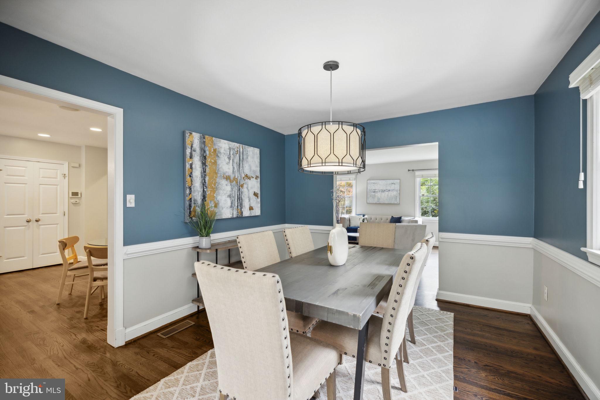 8012 Beech Tree Road Bethesda, MD 20817 - Photo 5 of 25 a view of a dining room with furniture window and wooden floor