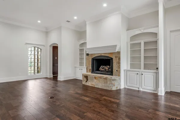 a view of kitchen with cabinets and wooden floor