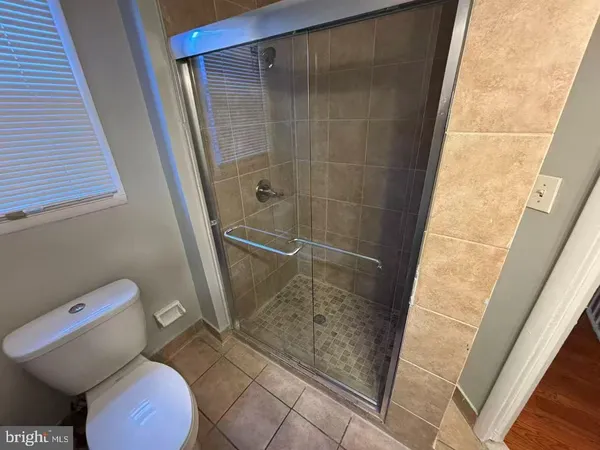 a bathroom with a sink and toilet