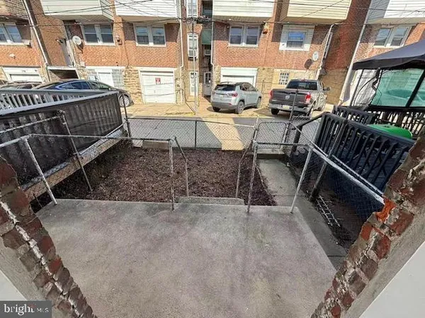 a view of an outdoor space with seating area