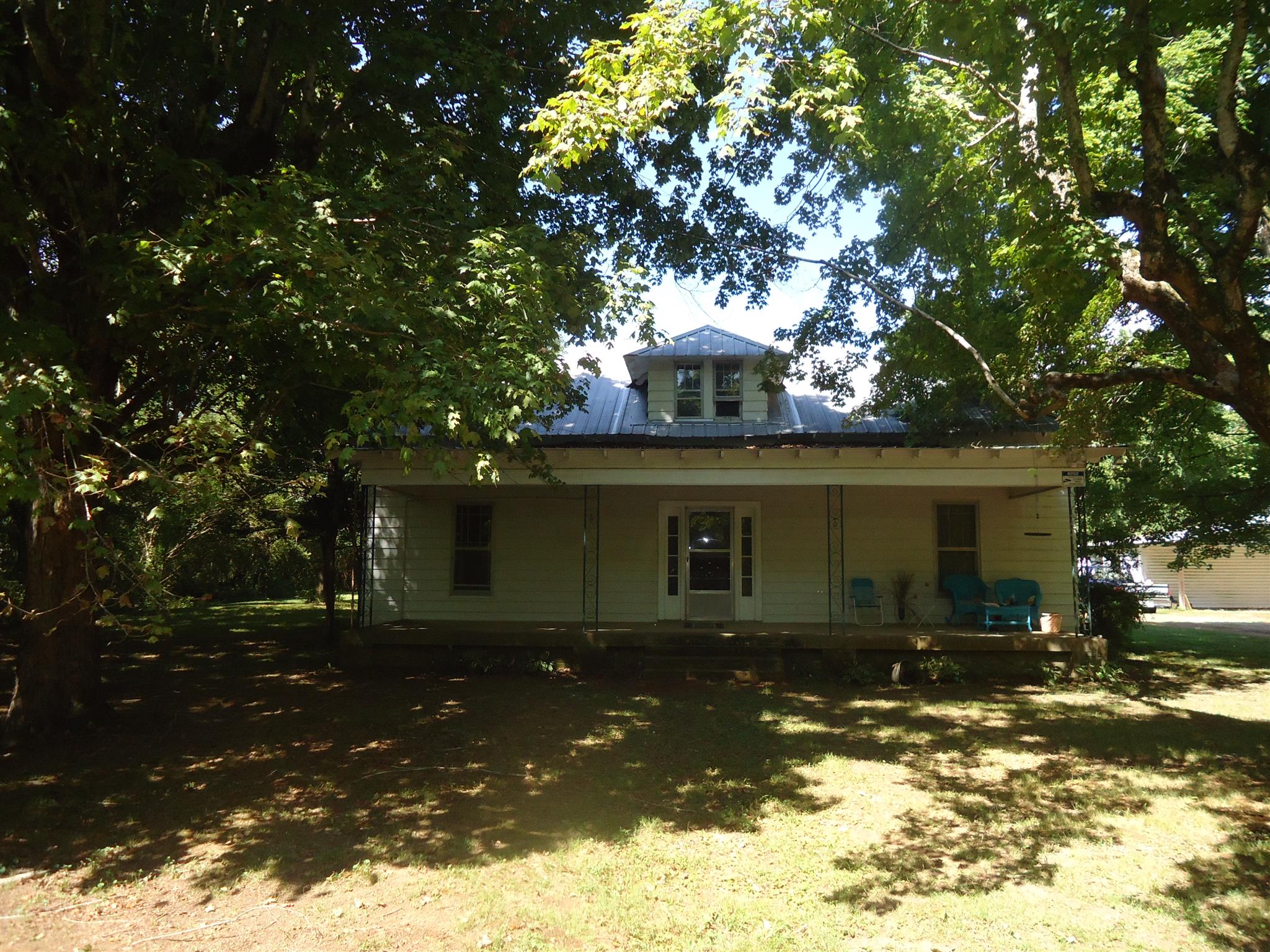 161 Bee Road Prospect, TN 38477 - Photo 1 of 19 a front view of a house with a yard