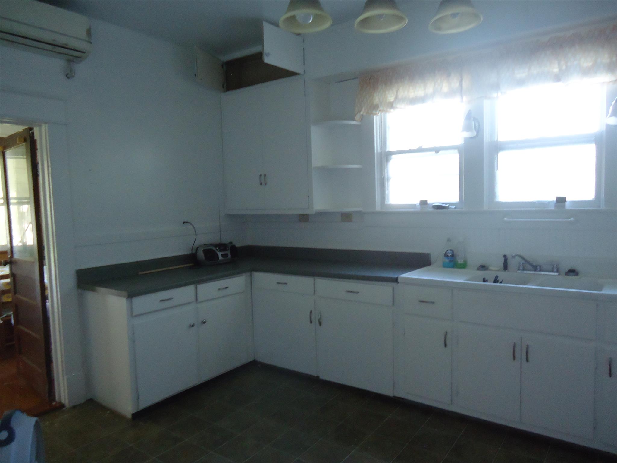 161 Bee Road Prospect, TN 38477 - Photo 14 of 19 a kitchen with a sink cabinets and window