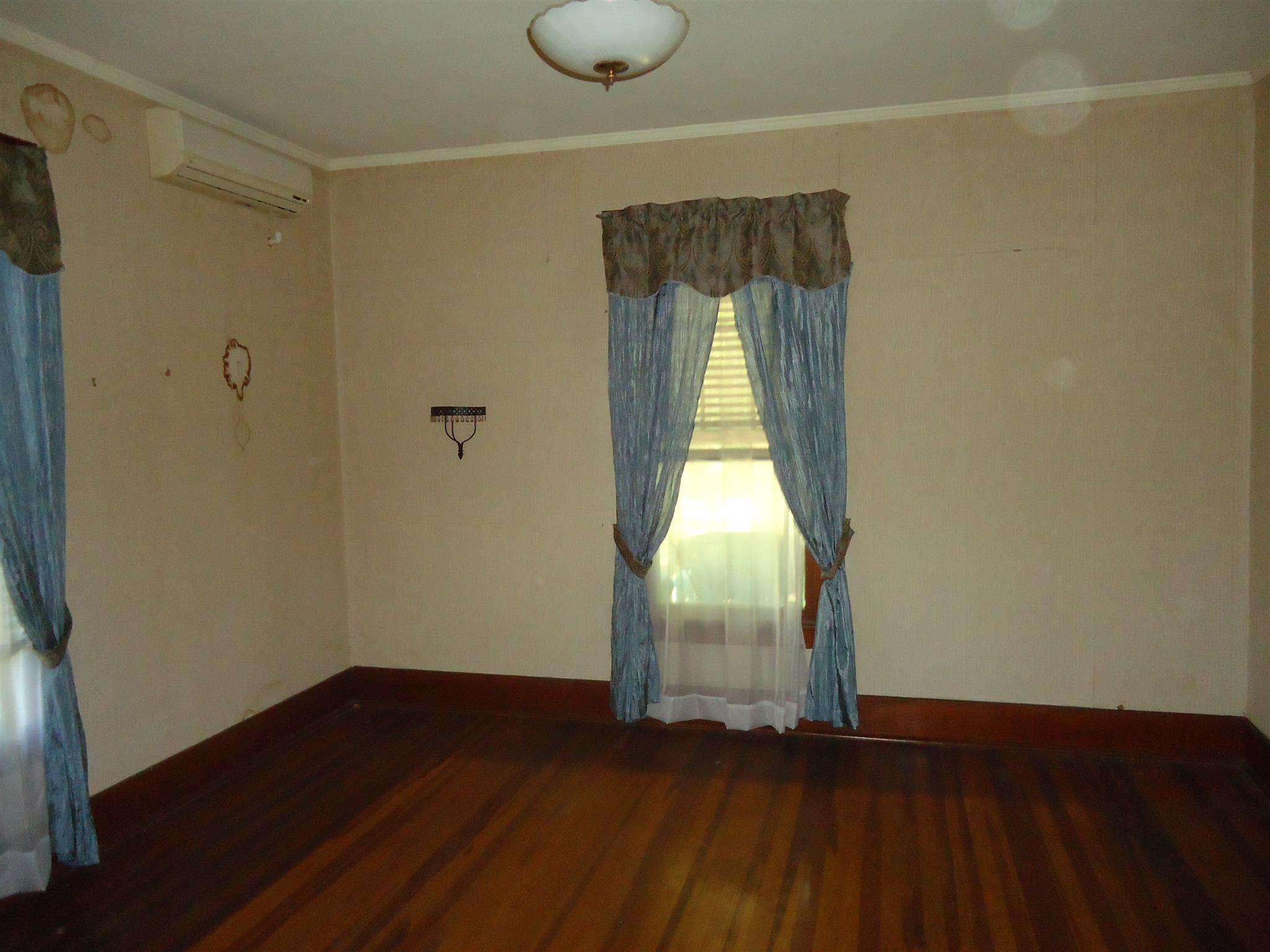 161 Bee Road Prospect, TN 38477 - Photo 19 of 19 an empty room with wooden floor and windows