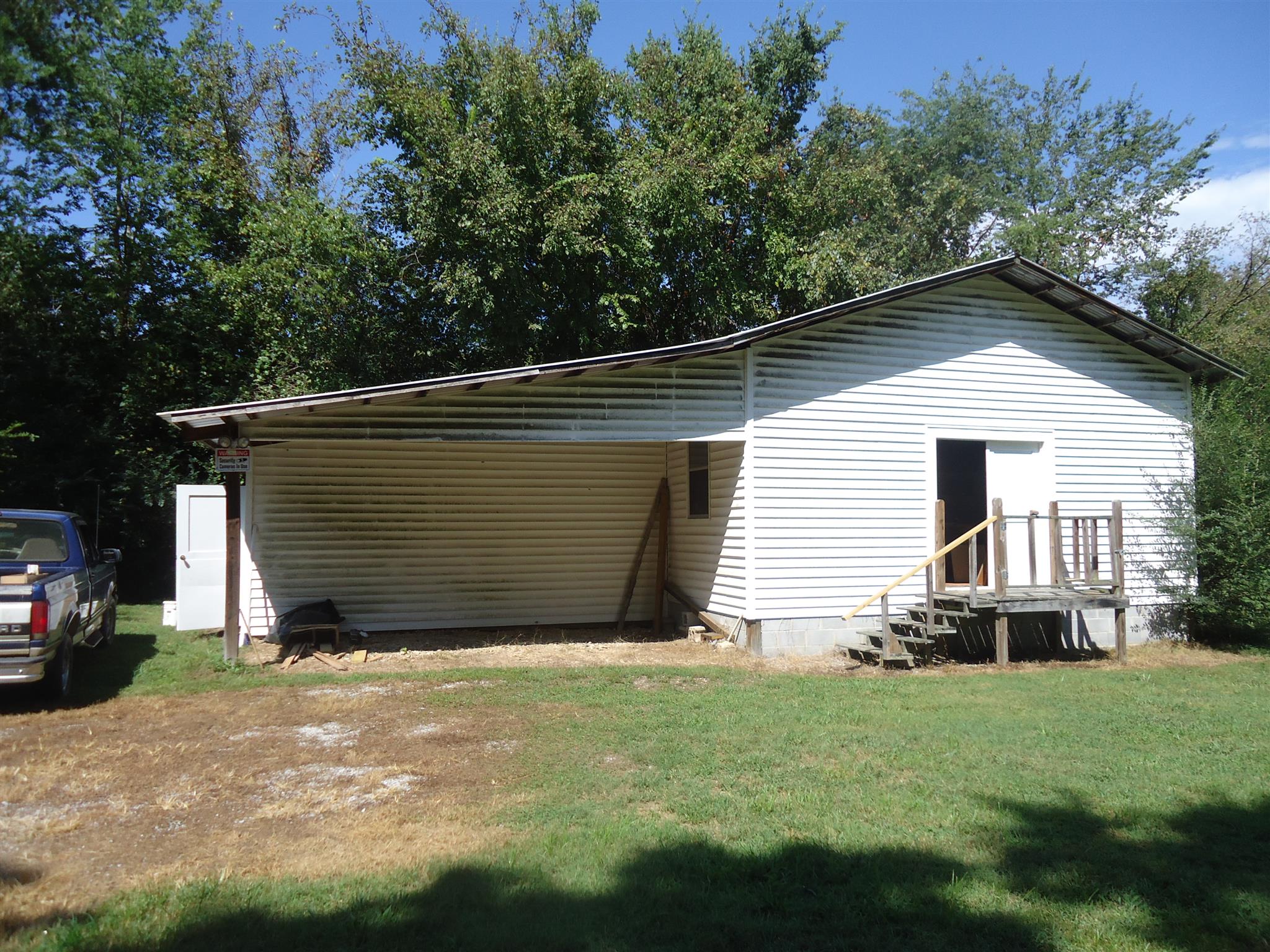 161 Bee Road Prospect, TN 38477 - Photo 4 of 19 a view of a house with a yard