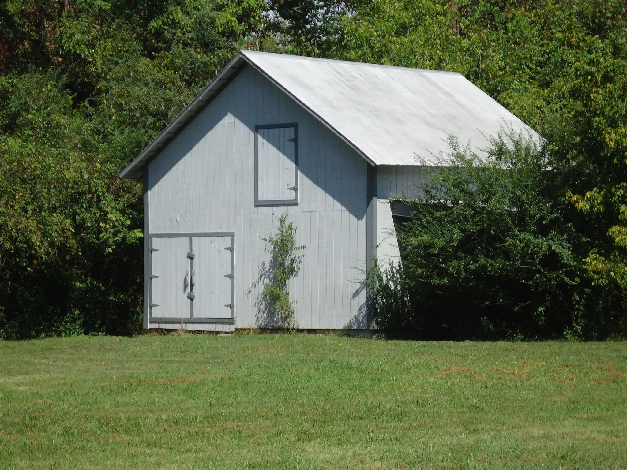 161 Bee Road Prospect, TN 38477 - Photo 8 of 19 a backyard of the house