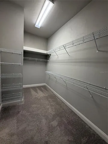 a view of a room with racks on the wall