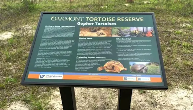 a sign that is on the side of a building