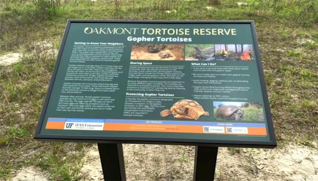 11822 Southwest 34th Road Gainesville, FL 32608 - Photo 23 of 24 a sign that is on the side of a building