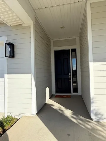 a front view of a house with a garage