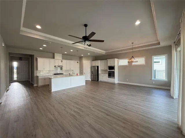 a view of kitchen and windows
