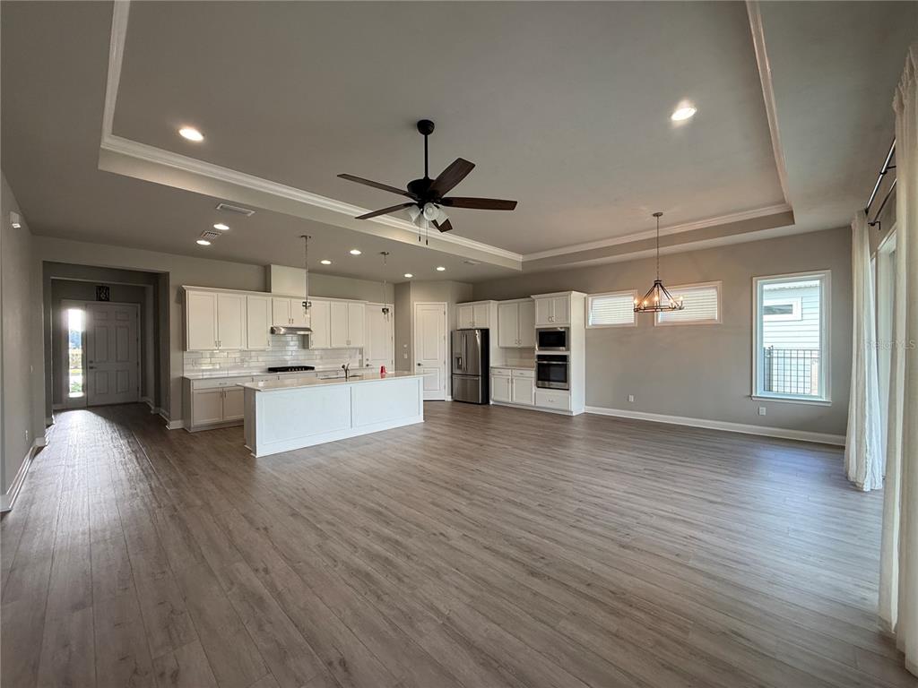 11822 Southwest 34th Road Gainesville, FL 32608 - Photo 7 of 24 a view of kitchen and windows