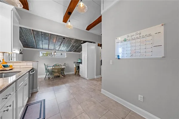a view of storage and utility room in a kitchen