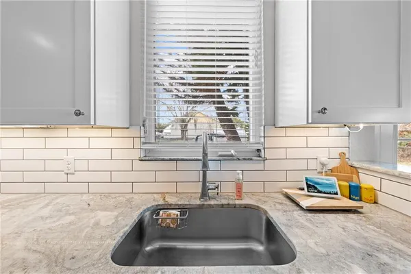 a bathroom with a sink and a bathtub