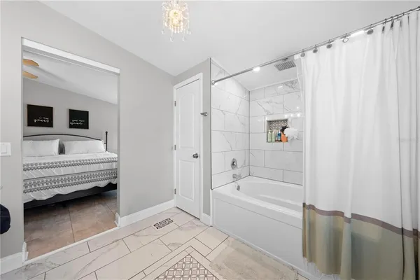 a bathroom with a sink and a bathtub