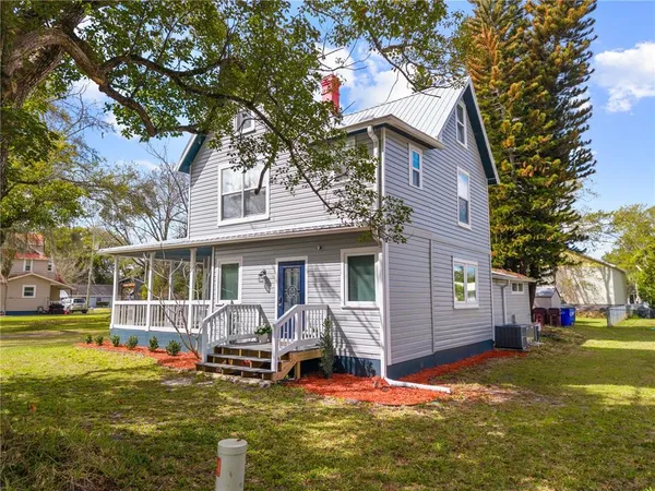 a view of a house with a patio