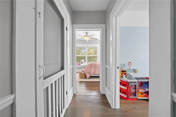 a storage & utility room with lots of stuff and toys