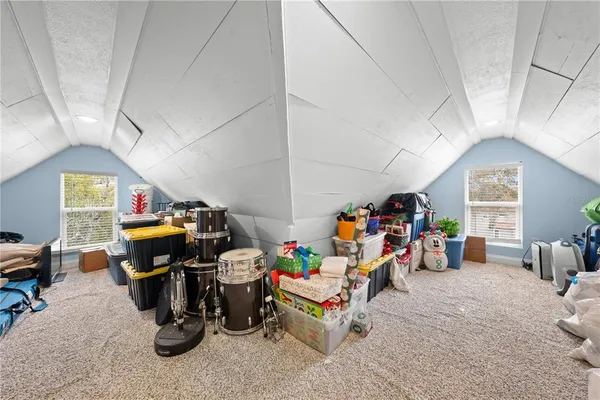 a view of a porch with wooden floor and stairs