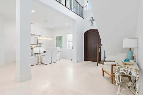 a white bath tub sitting next to a shower