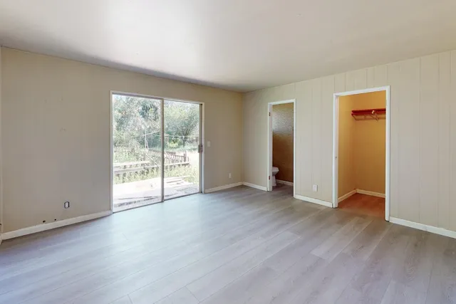 a view of a back yard of the house