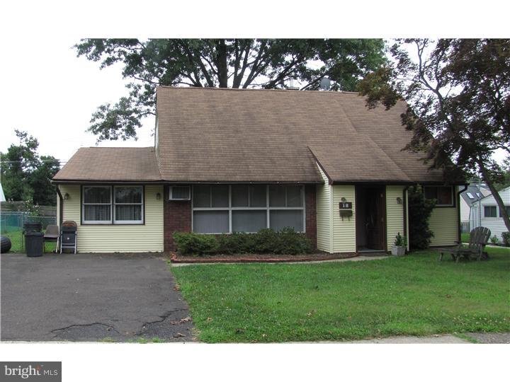 18 Tinder Road Levittown, PA 19056 - Photo 1 of 25 a view of a yard in front of a house