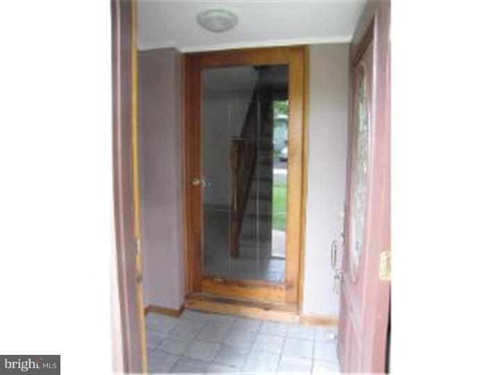 18 Tinder Road Levittown, PA 19056 - Photo 2 of 25 a view of a bathroom with a glass door