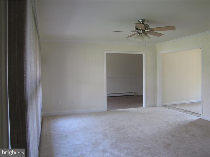 18 Tinder Road Levittown, PA 19056 - Photo 13 of 25 a view of an empty room and closet area