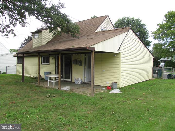 18 Tinder Road Levittown, PA 19056 - Photo 9 of 25 a backyard of a house with table and chairs