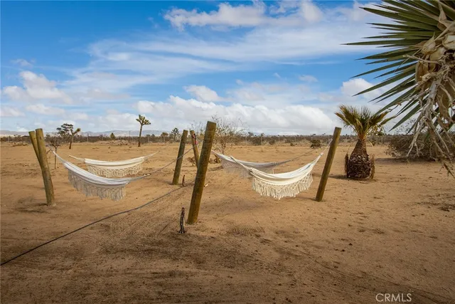 a view of a swimming pool with a terrace