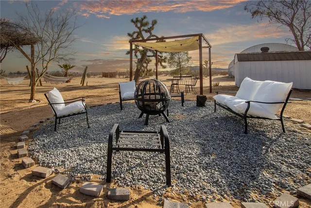 a view of a terrace with furniture