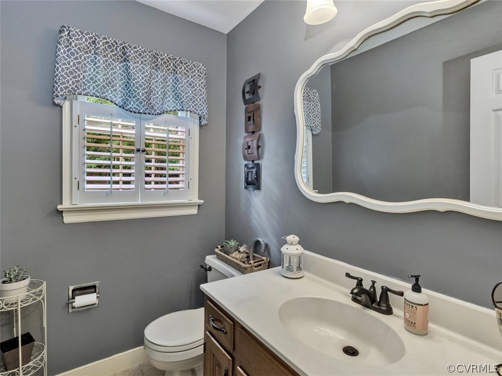 13631 Castleway Road Midlothian, VA 23114 - Photo 18 of 37 1st floor powder room with tile floor and updated