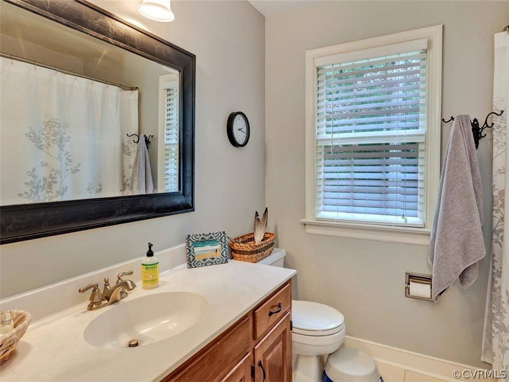 13631 Castleway Road Midlothian, VA 23114 - Photo 26 of 37 Full hall bath with tile floor, tub/shower and upd