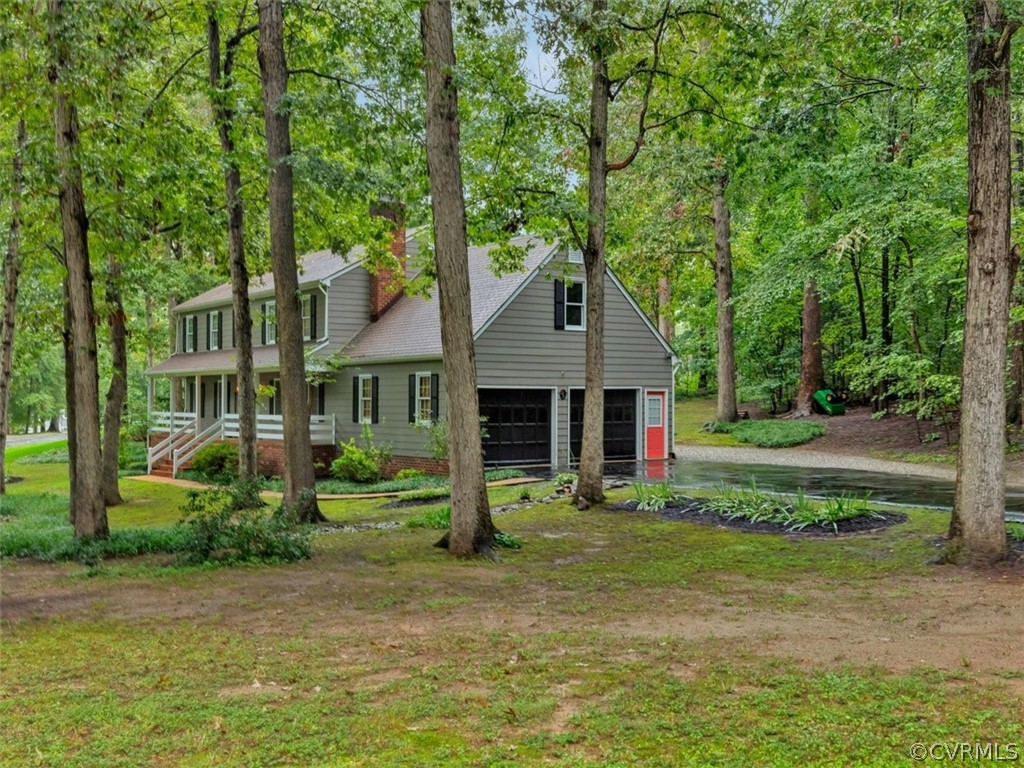 13631 Castleway Road Midlothian, VA 23114 - Photo 33 of 37 Side view of home, paved drive and mature trees fo